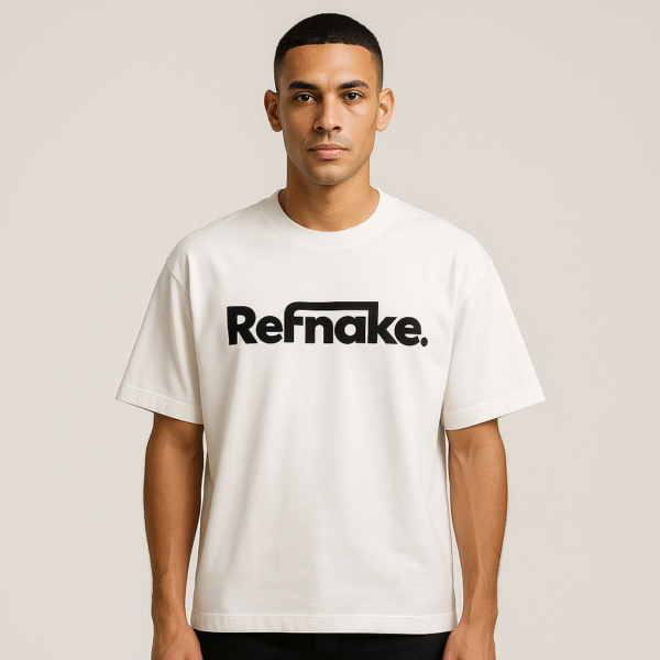 20250823_0252_Fashion Model Photoshoot_remix_01k3a6frnef0qrevnbwzw59rpb (1) Refnake Black Logo Oversized White T-Shirt